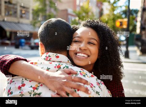 Meeting Friends Hug High Resolution Stock Photography and Images - Alamy