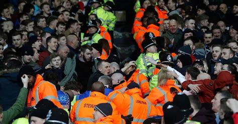 Police battle to keep rival fans apart as West Brom and Stoke supporters clash at The Hawthorns ...