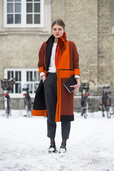 Orange you glad she added some wow-factor color? | 70+ Winter Street Style Looks to Inspire Your ...