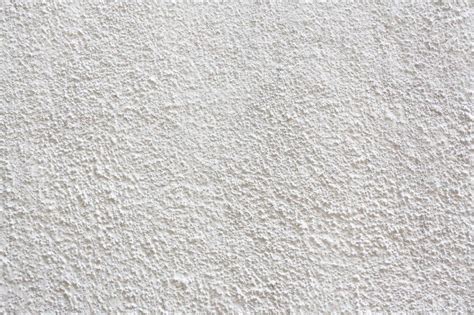 Stucco wall - White stucco textured wall background with natural light. Stock Photo - 54104929 ...