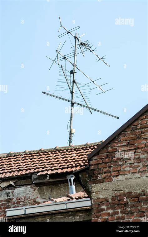 Old tv antenna on roof top Stock Photo - Alamy