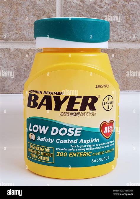 Close-up of Bayer brand low-dose aspirin or baby aspirin in bathroom ...