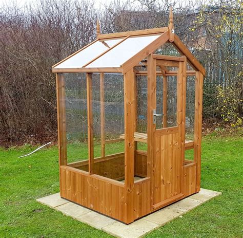 Swallow Lark 4x4 Wooden Greenhouse | Greenhouse Stores | Wooden greenhouses, Small wooden ...