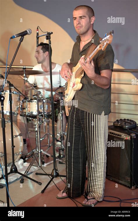 Bass Guitarist in a Rock Band Stock Photo - Alamy