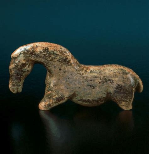 "The Wild Horse from Vogelherd". Germany 30-25,000 yrs old. Carved mammoth tusk with engraved ...