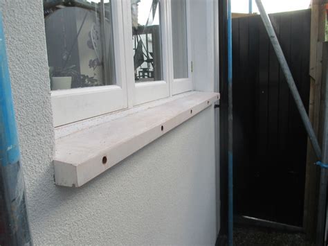 How do you deal with window sills during External Wall Insulation?