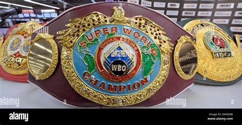 The three world championship boxing belts of boxing associations IBF (L-R), WBO and IBO captured ...