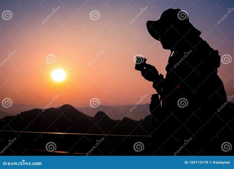 Silhouette Handsome Man Looking Forward with Binoculars at a Mountain ...