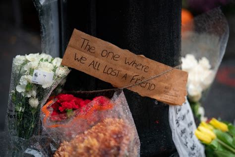 Fans Leave Tributes For Matthew Perry Outside 'Friends' NYC Apartment