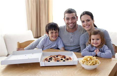 Family Eating Pizza And Fries At Home | Ellyn Satter Institute