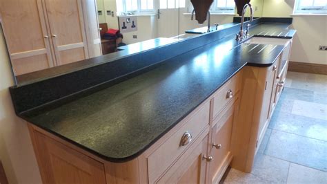 Capital Granite: Black Pearl granite with leather finish / Bianco ...