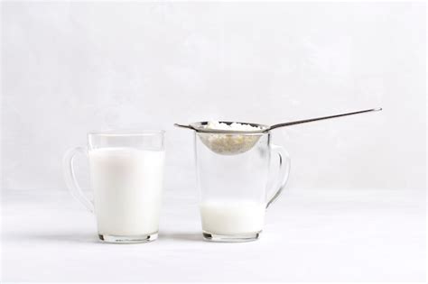 Premium Photo | Kefir fermented milk drink with kefir grains.