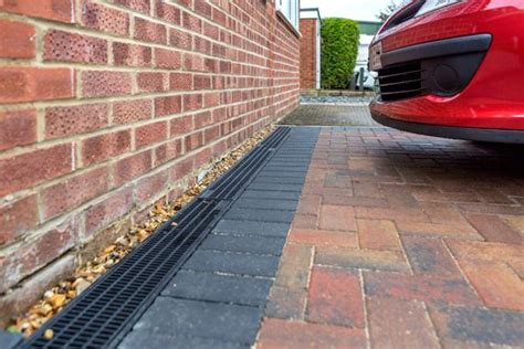 Installing Channel Drains Correctly | The New Driveway Company