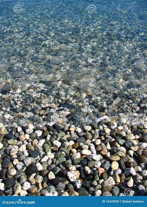 Stone beach stock image. Image of beach, coast, blue, rocks - 1047839