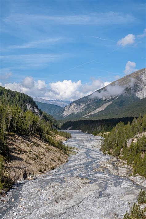 Valley in the Swiss National Park Stock Photo - Image of fuorn, clouds ...