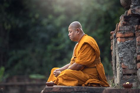 Buddhist monk meditation in temple by Sasin Tipchai / 500px