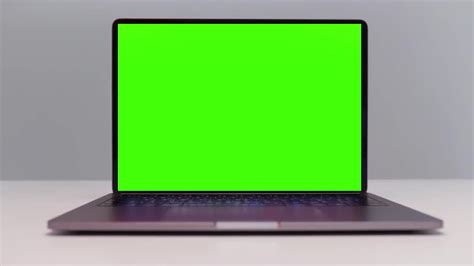 A Laptop With Green Screen - Stock Video | Motion Array