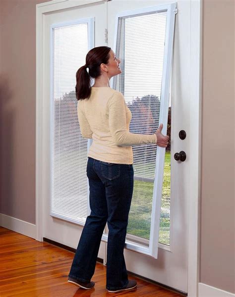 french doors with blinds between the glass - Builders Villa