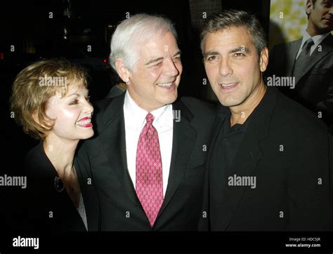 Actor George Clooney, right, with his father, Nick Clooney and his wife ...