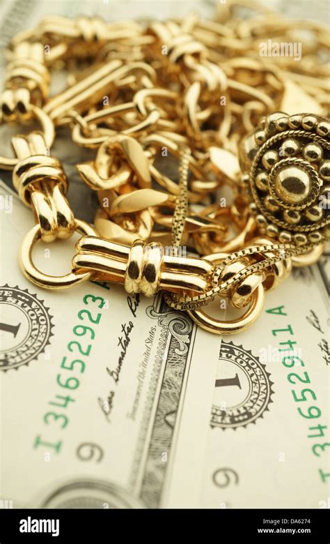 Gold Jewelry and Money Stock Photo - Alamy