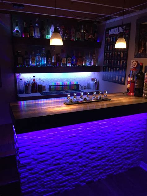 Basement bar with LED lights | Basement bar designs, Home bar plans ...