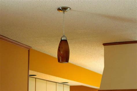 DIY Network has instructions on how to install a new pendant light. Pulley Pendant Light ...