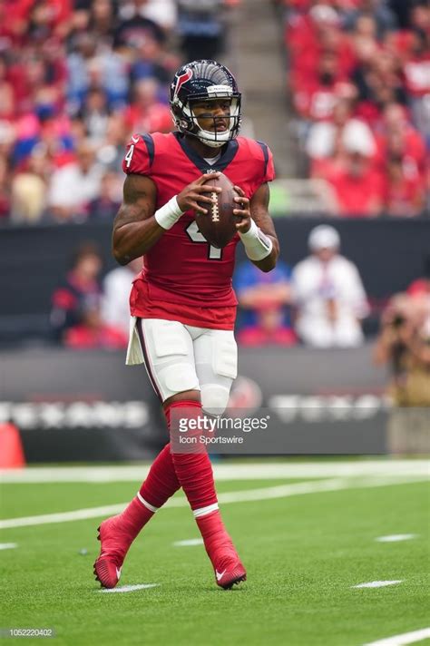 Houston Texans quarterback Deshaun Watson drops back to throw during... | Texans football, Nfl ...