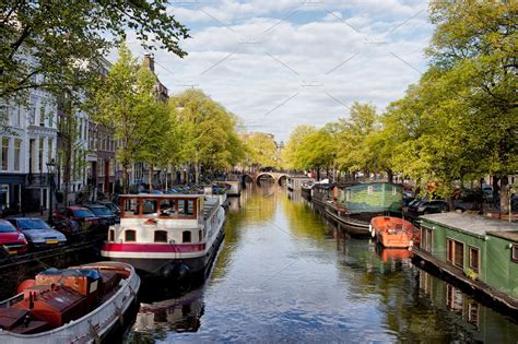 Amsterdam Canal With Houseboats | Architecture Stock Photos ~ Creative ...