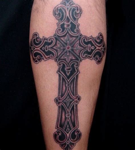 Impressive black cross tattoo