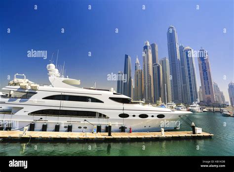 Skyline of Dubai with yacht harbour Stock Photo - Alamy