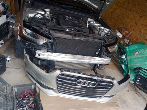 Audi A4 front grille replacement. drop the bumper by removing the 10mm bolt and screw from each ...