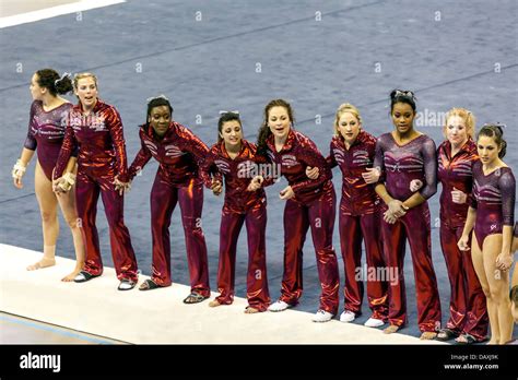 Alabama Crimson Tide women's gymnastics team cheer on fellow vaulting Stock Photo, Royalty Free ...