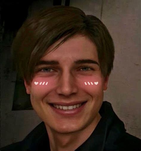 a man smiling with two white lights on his face in the shape of arrows above his eyes