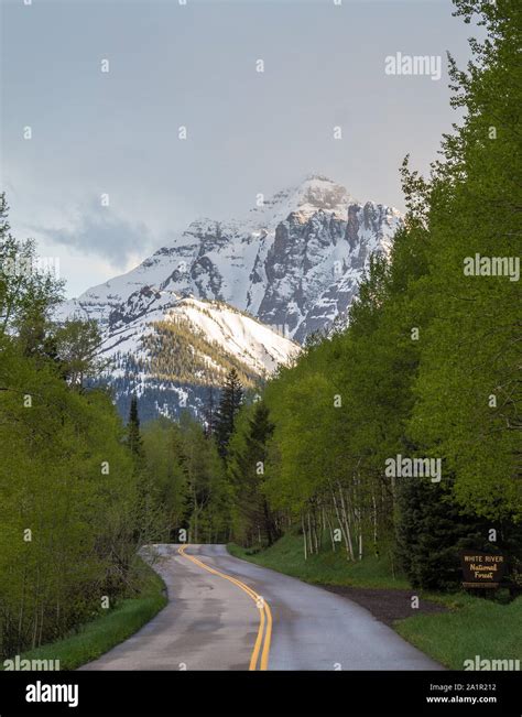 Road Leading into the mountains Stock Photo - Alamy