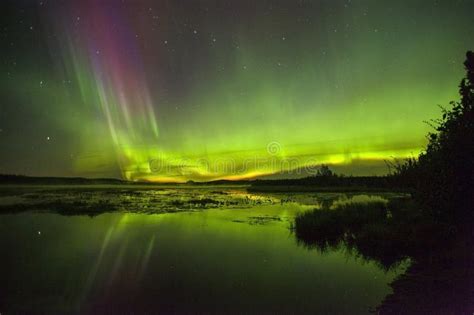 Northern Lights Over Watson Lake in Alaska Stock Photo - Image of stunning, outdoors: 108215228