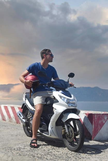 Premium Photo | Young man motorbike driver against south south china sea in vietnam