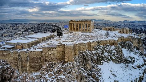 The iconic Acropolis in Athens is covered in snow for the first time in decades - Flipboard