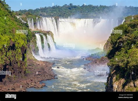 Rainbow and Iguazu Falls. Iguazu Falls are waterfalls of the Iguazu ...