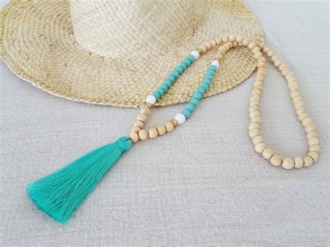 Wednesday Watch List | Beaded tassel necklace, Tassel necklace, Beaded tassels