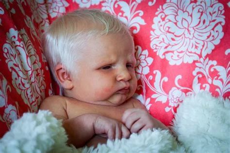 Newborn baby with shock of white hair sends internet into meltdown with ...