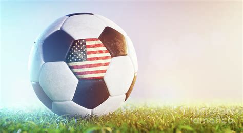 Football soccer ball with flag of USA on grass Photograph by Michal ...