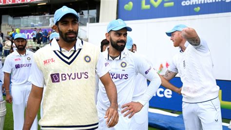 Jasprit Bumrah and Virat Kohli lead the players onto the field ...