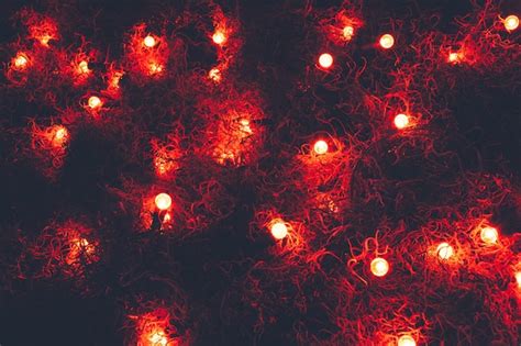 Premium Photo | Red christmas lights background