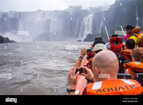 Boat ride under the waterfalls at Iguazu Falls (aka Iguassu Falls or Cataratas del Iguazu ...