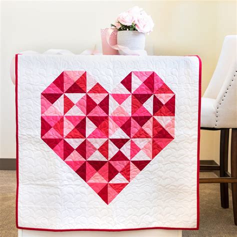 Stitches from the Heart finishes at 35″ x 35″. The pattern also offers a mini 12″ X 12″ version!