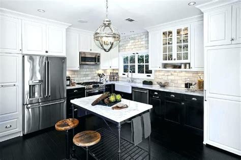 Image result for black kitchen cabinets brass hardware | Black kitchens, Kitchen remodel, Black ...