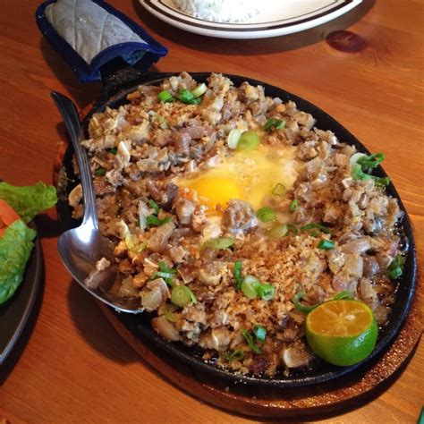 Pinoy Food Delights: Sizzling Chicken Sisig