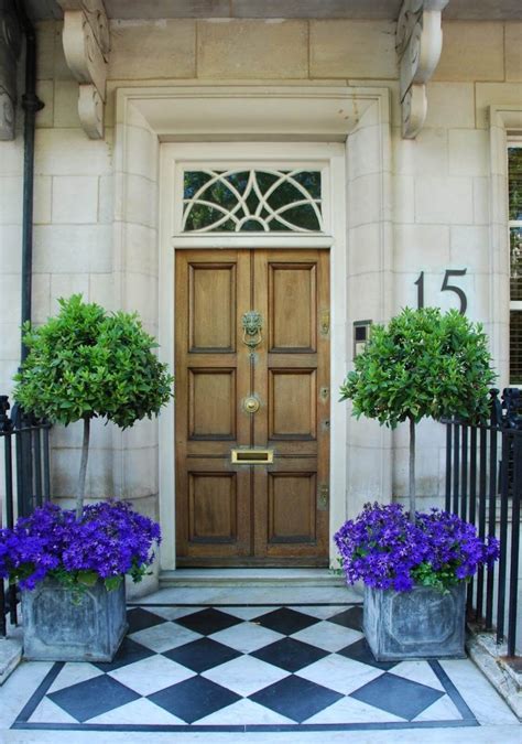 Decorate the entrance door with plants and flowers