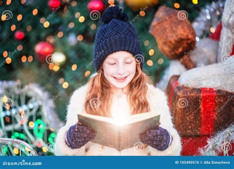 Christmas Miracle Child Photo Stock Photo - Image of daughter, book: 105490576