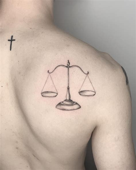 Justice tattoo by Conz Thomas inked on the right shoulder | Justice tattoo, Scale tattoo ...